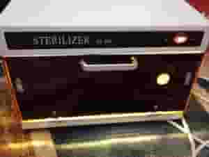 جهازين لتعقيم ادوات الحلاقه