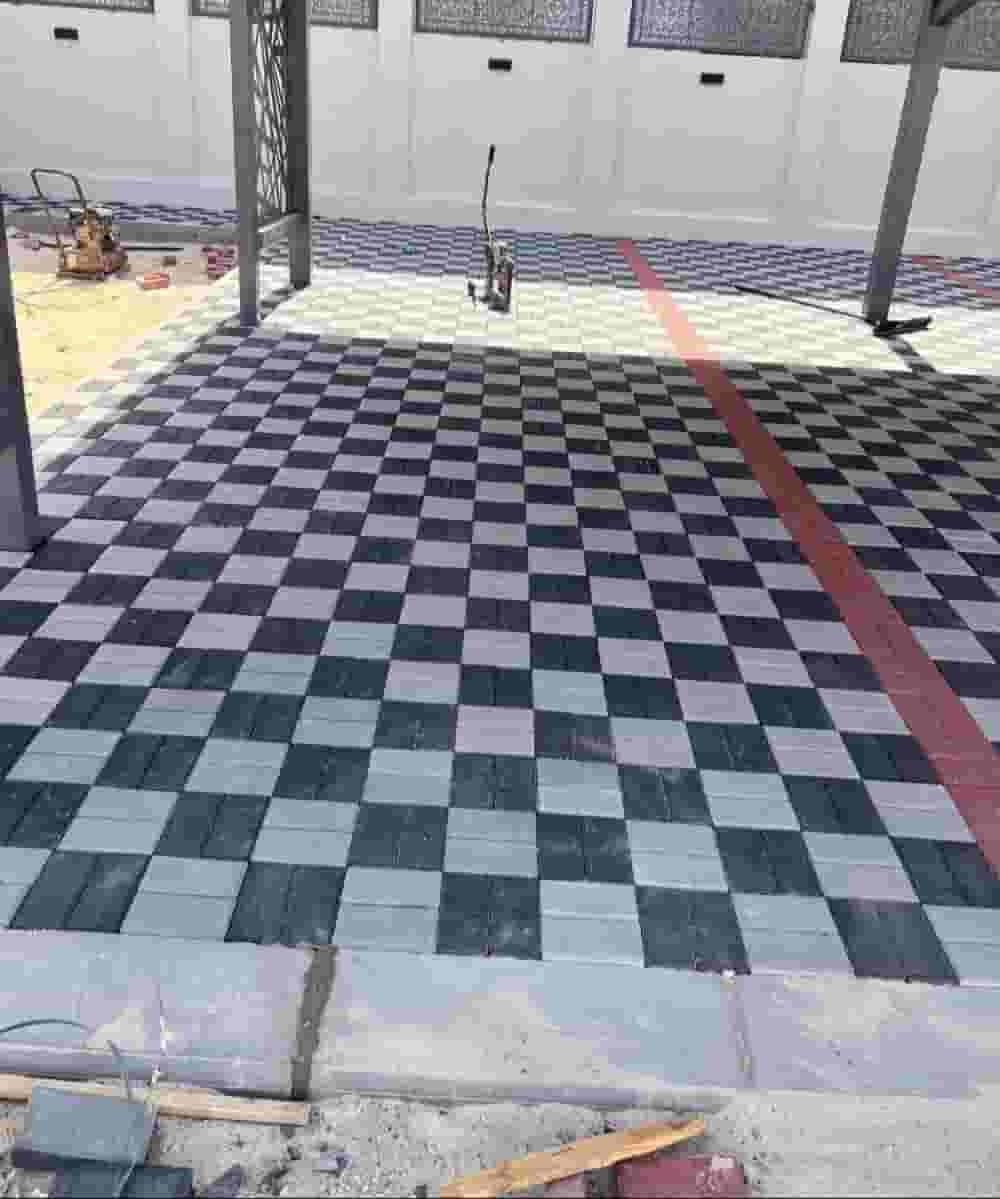 Installing overlapping tiles and crabstone and landscaping