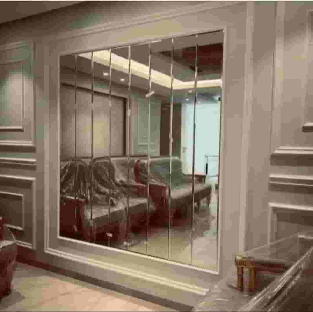 Designing glass and mirrors and installing showers