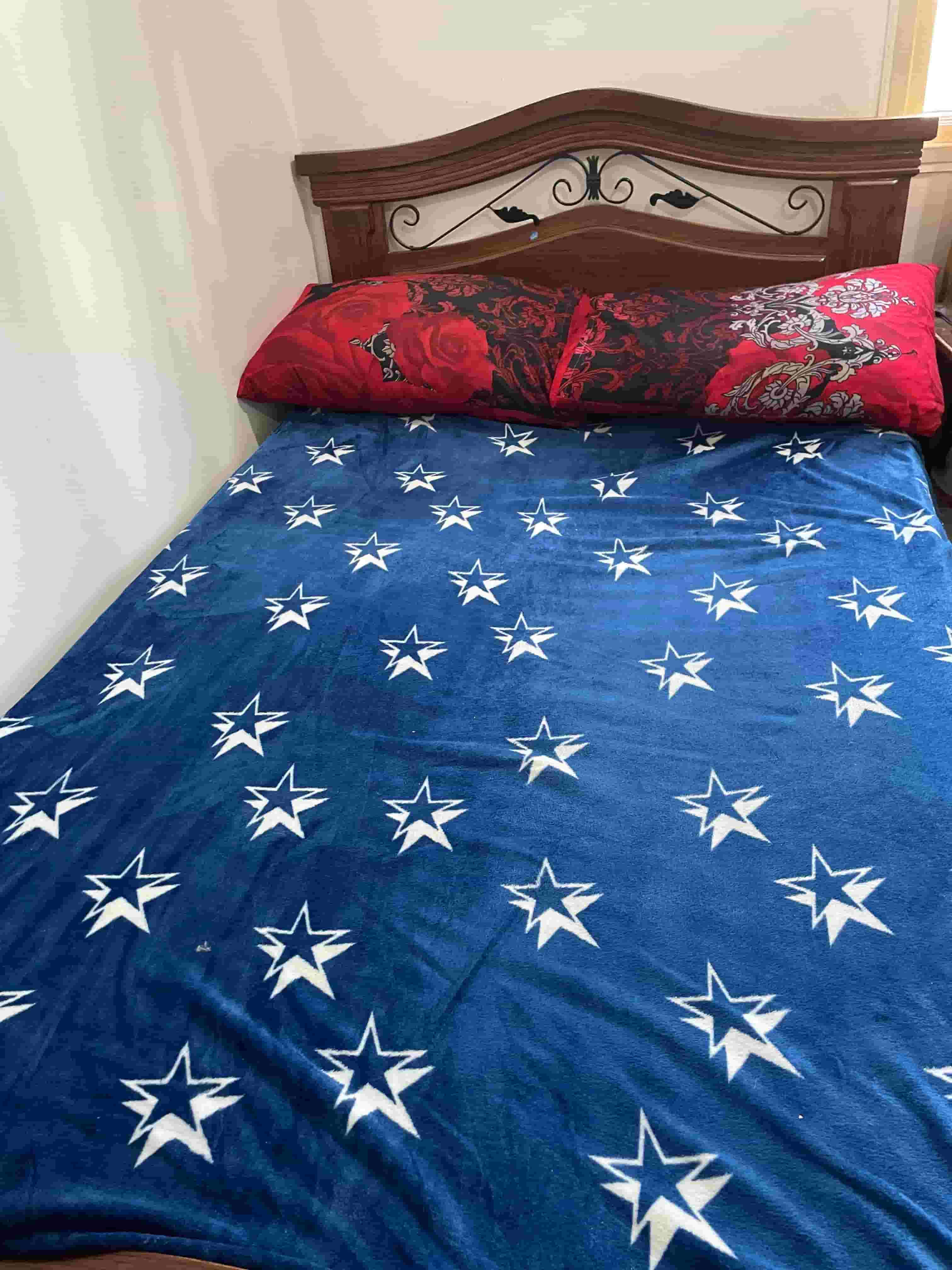 Wooden bed in excellent condition and tidy