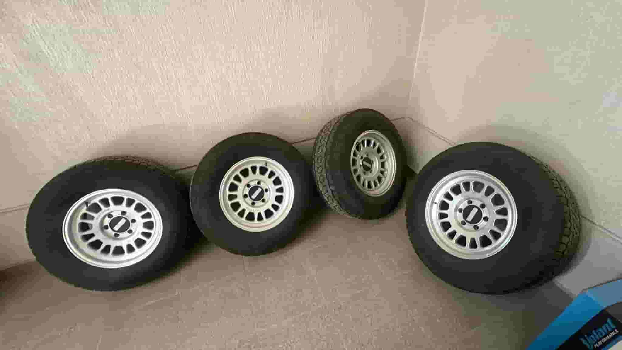 A set of tires and rings in excellent condition