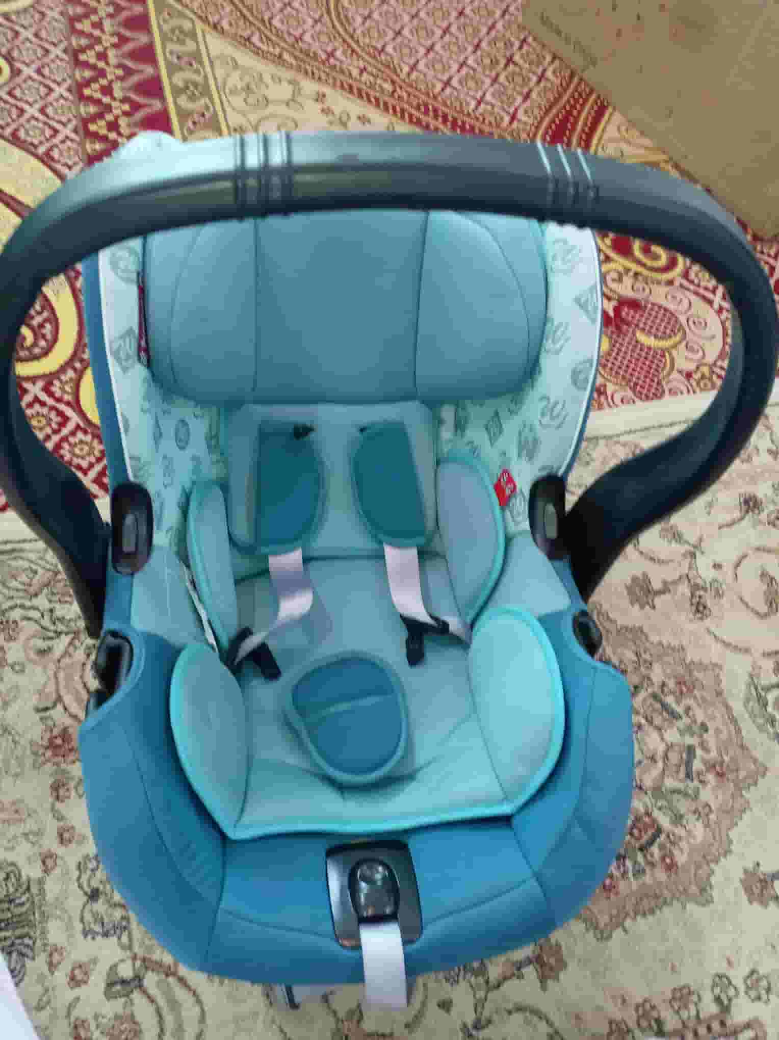 A very safe baby chair for the car and home with a belt
