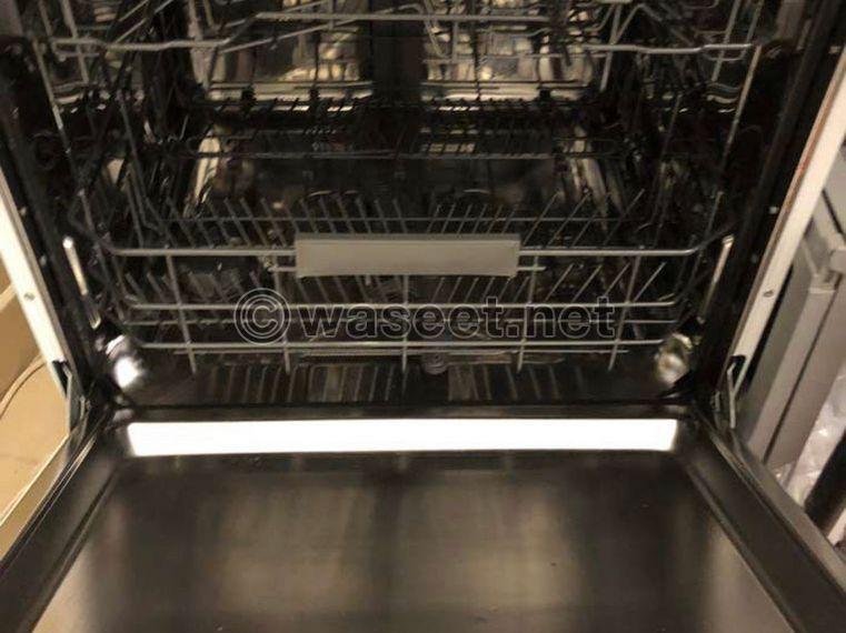 A dishwasher and various furniture 0