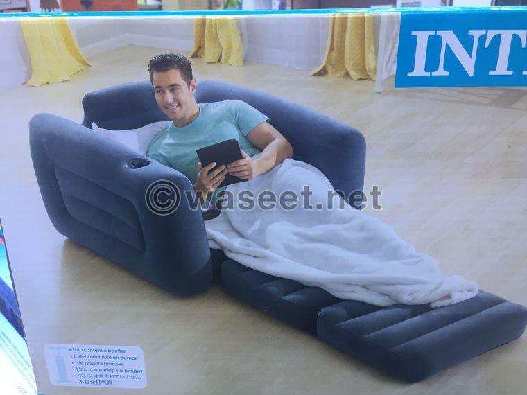 A chair with an inflatable bed for land, trips or home  1