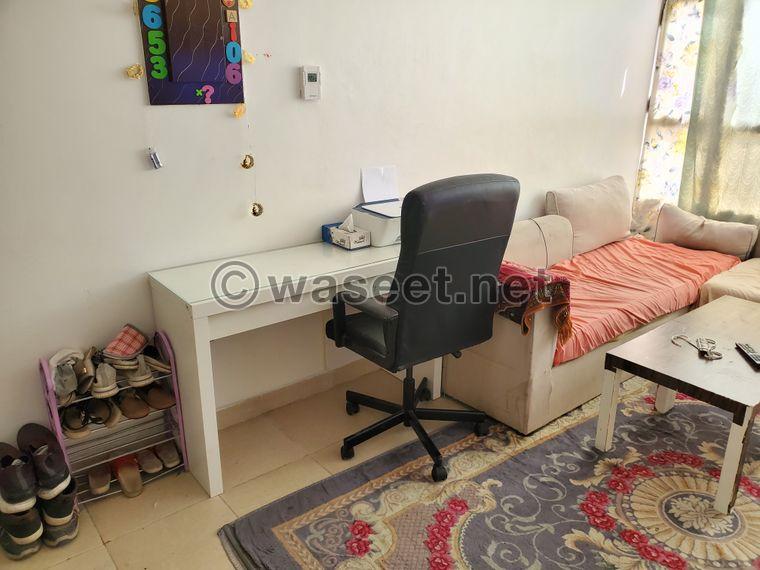 A room inside a fully furnished apartment 6