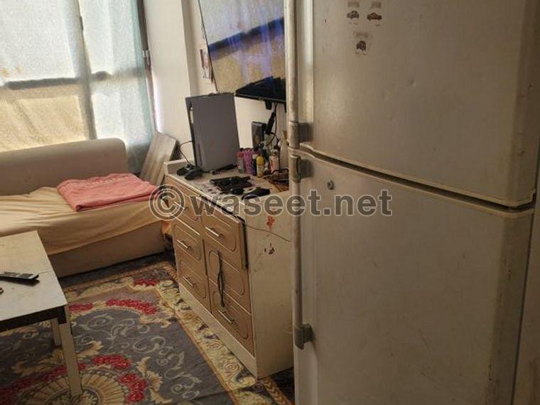 A room inside a fully furnished apartment 3