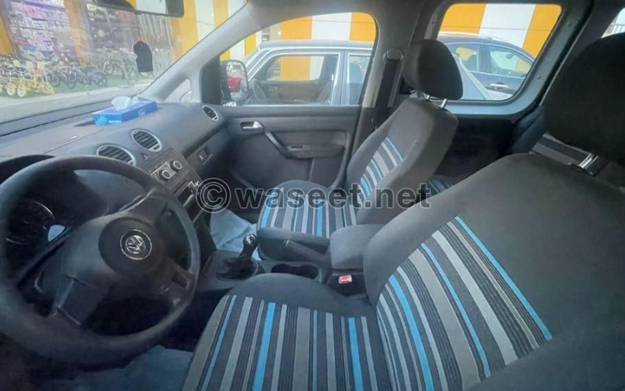 Volkswagen Caddy passenger model 2013 1