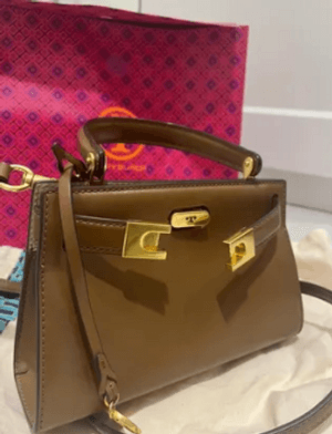 For sale a light brown leather bag