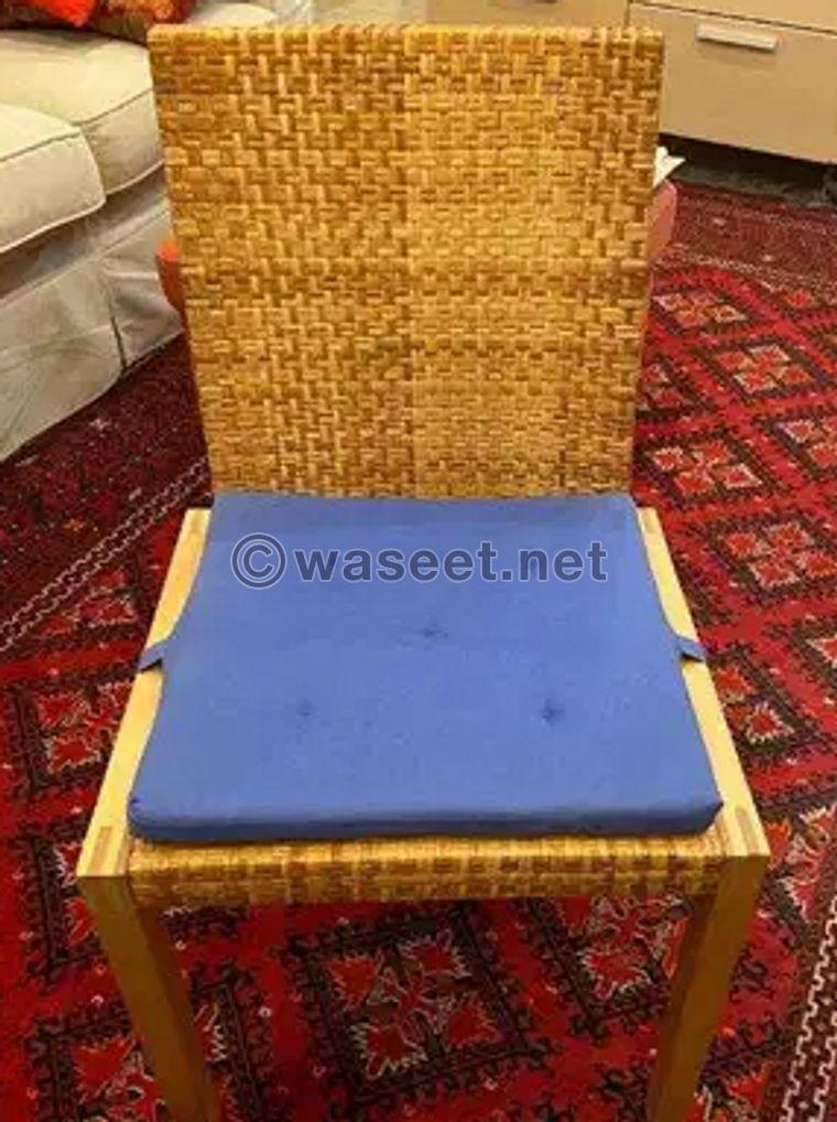 chair with blue cushion 0