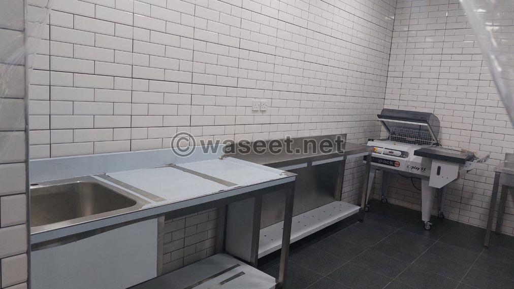 For sale a central kitchen with a restaurant in Ardiya 3