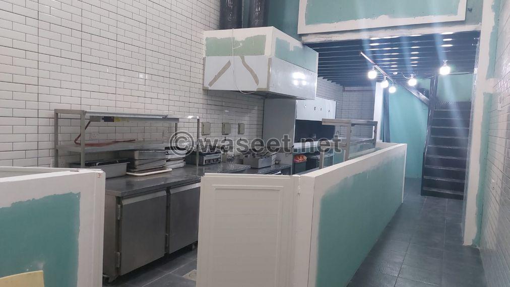 For sale a central kitchen with a restaurant in Ardiya 7