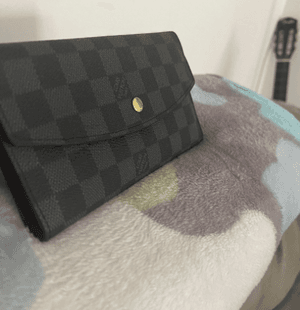 One bag for women is Gucci and the other is LV First